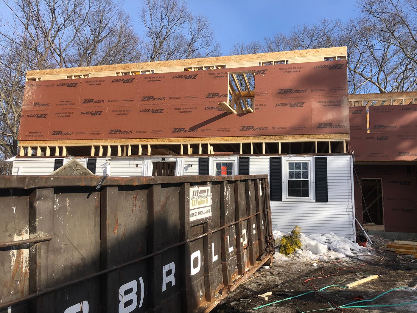 Second-story framing and expansion in progress at Garland Rd., Newton