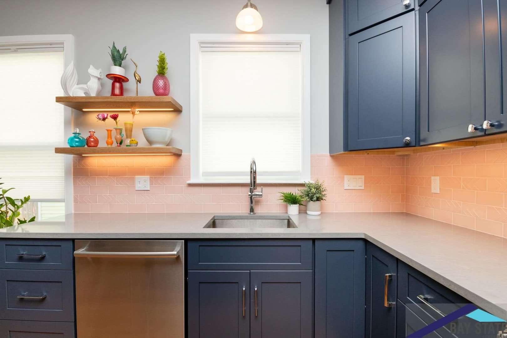 Dalrymple St. Jamaica Plain kitchen after remodel, gray quartz counter and pink tile backsplash at sink