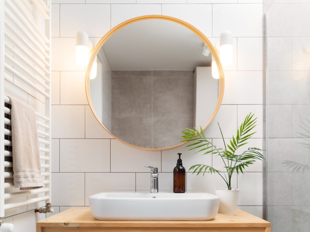 anti-dandruff products by bathroom sink