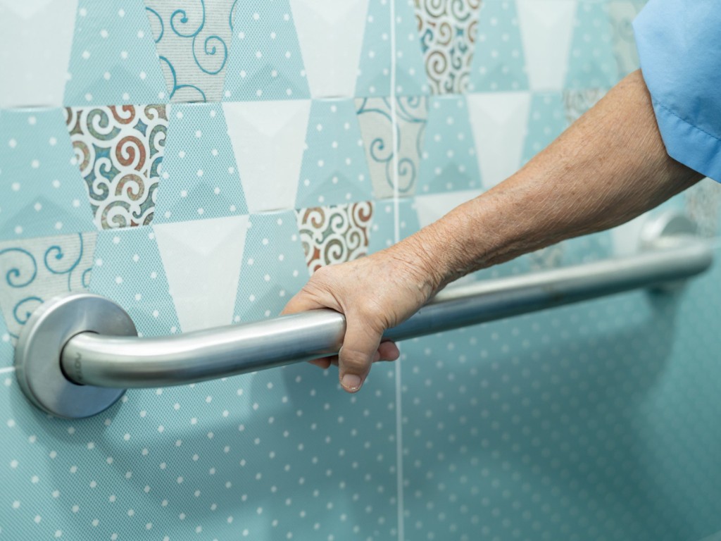 senior woman patient toilet hospital