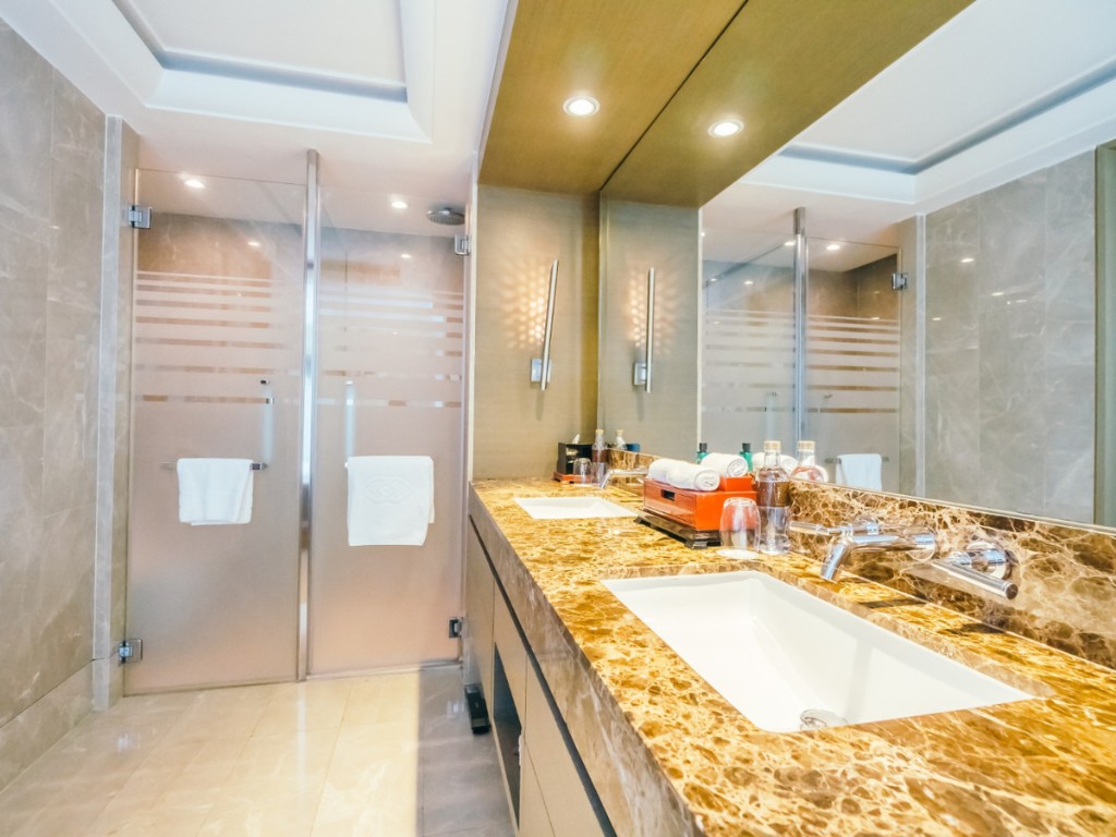 tidy bathroom with shiny tiles