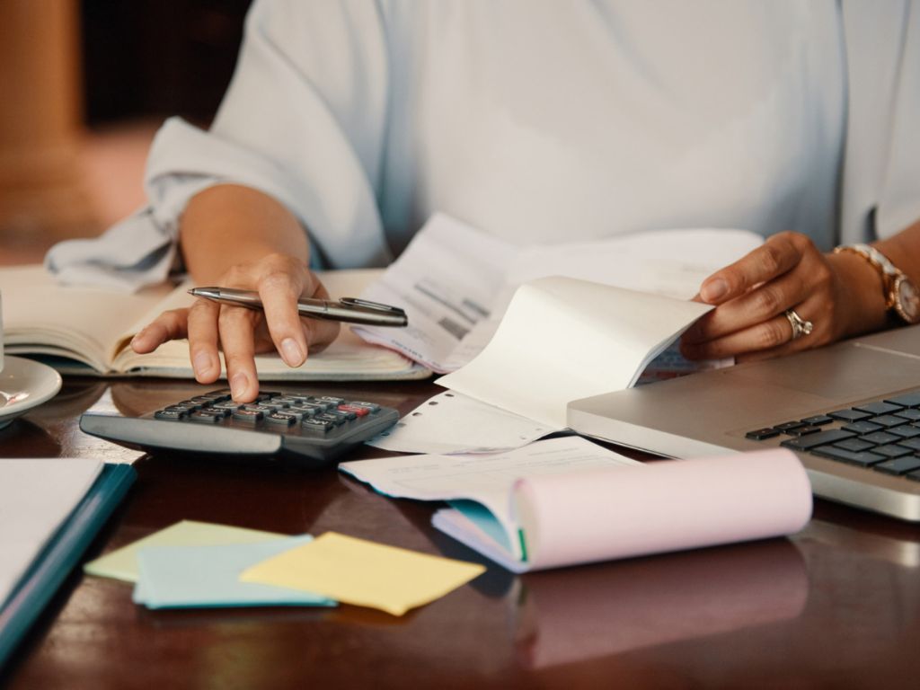 entrepreneur working with bills