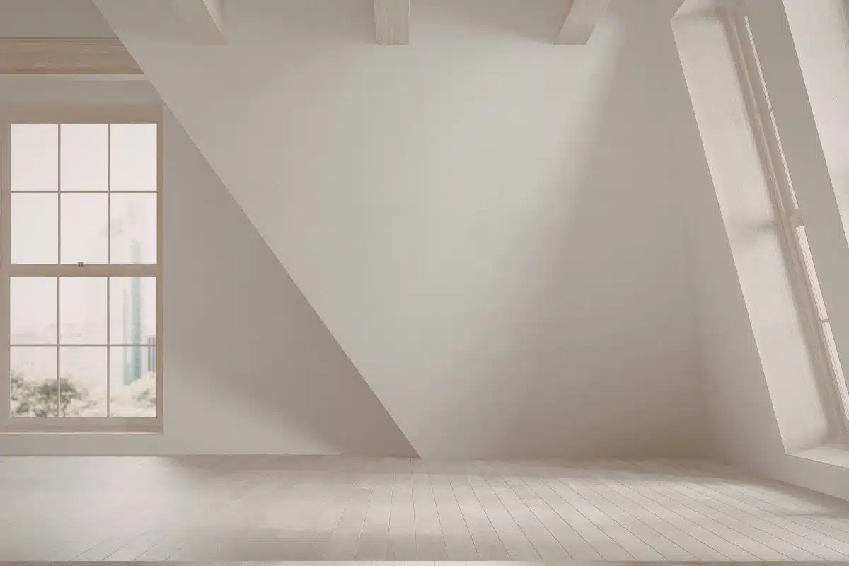 Empty attic room with sloped ceiling attic conversion ideas to add living space